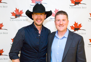 Country music superstar Paul Brandt was on-hand to help celebrate Canadian Beef, shown here with Canada Beef president, Rob Meijer.