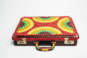Norm Kelly's briefcase, adorned with Skittles