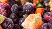 Frozen mix of fruits and vegetables. Close-up.